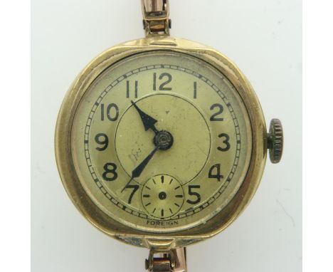 9ct gold ladies wristwatch on 9ct gold expanding bracelet, 16.1g, working at lotting up. UK P&amp;P Group 1 (£16+VAT for the 