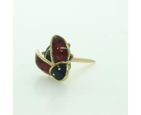 Life-size yellow metal and enamel ladybird pin brooch, marks to pin indistinct. UK P&amp;P Group 1 (£16+VAT for the first lot
