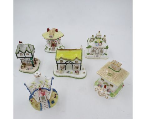 Six Coalport cottages, no cracks or chips , largest H: 12cm. UK P&amp;P Group 3 (£30+VAT for the first lot and £8+VAT for sub