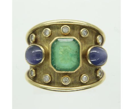 Large 18ct trilogy ring set with emerald, sapphire cabochons and surrounded by diamonds, size P/Q, 8.0g, good condition, ligh