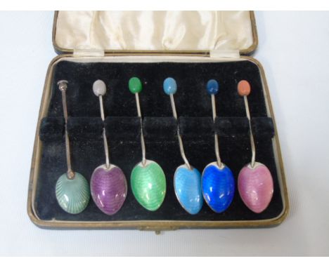 5 Matching Enamel backed spoons, plus one smaller example