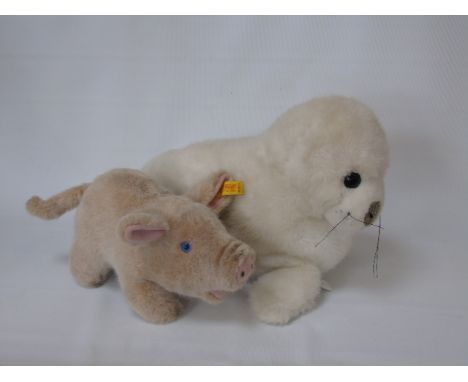 2 Steiff soft toys, a pig and a seal