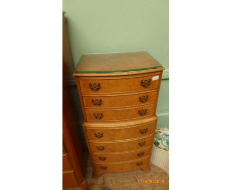 Chest on chest of three on four all with black painted finger plates and drop handles on bracket feet