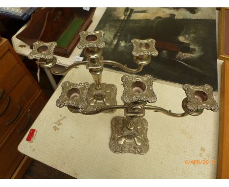 Pair of 3 arm plated candelabra each on ornate square plinth 