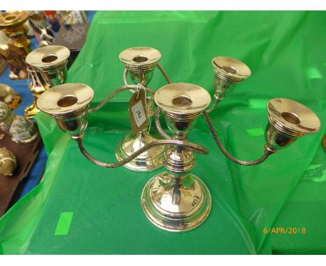 Pair of 3 arm silver plated candelabra each on circular plinth