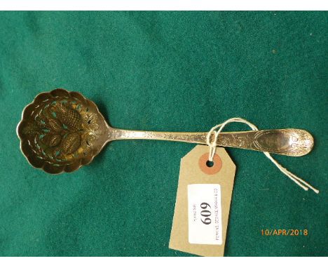 Most ornate embossed  berry sifter ladle (London 1784) ex William Summers