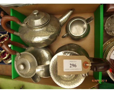 4 piece English beaten pewter part tea service incl. 3 pots