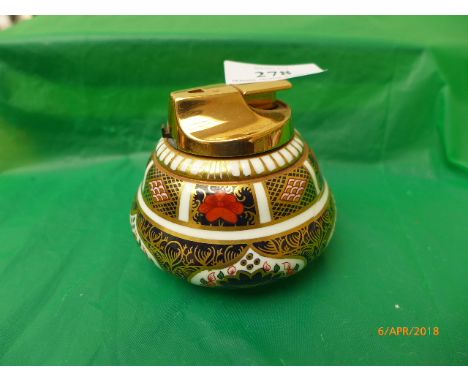 Cigarette lighter marked 1128 XL1 (damaged)