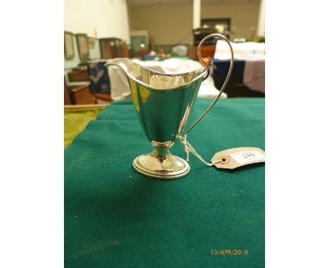 Helmet shaped silver cream jug (Birmingham 1905) 3oz (Guide Price £50-£60)