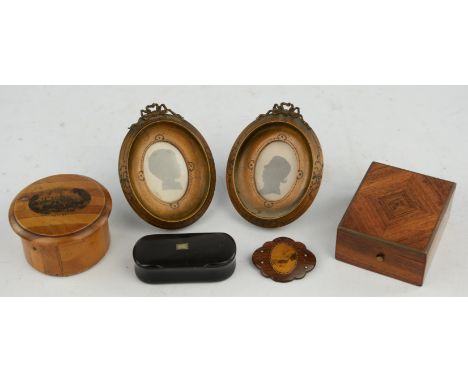 A pair of late 19th century French silhouettes housed in oval fruit wood frames, height 11cm, an early 20th century Kingwood 