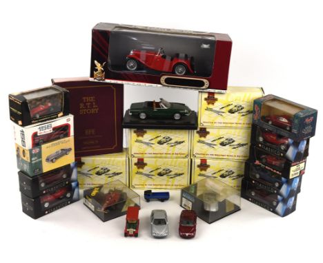 A quantity of modern die-cast vehicles including ; a 1:18 scale 1947 MG TC Midget, boxed, six Matchbox 'Collectibles' cars an