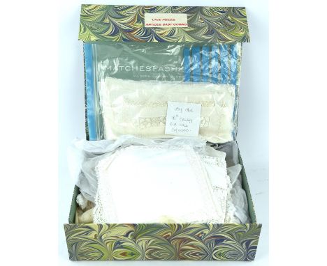 Collection of lace, linen and christening gowns