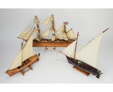 Scratch built scale model of the Cutty Sark, H34cms together with two skiffs, H46cms