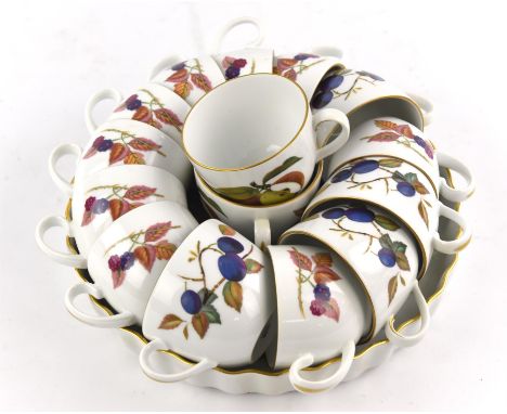Royal Worcester, a large quantity of Evesham pattern china, to comprise a large oval platter, nine dinner plates, twelve medi