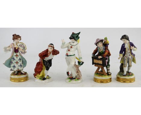 A pair of Sitzendorf porcelain figures depicting gallant and companion, height 15cm, another depicting a man with a monkey on