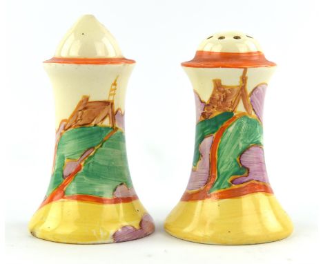 A pair of Clarice Cliff salt and pepper shakers, C.1930, decorated in the 'Orange Roof' pattern.  Height 8.5cmCondition Repor