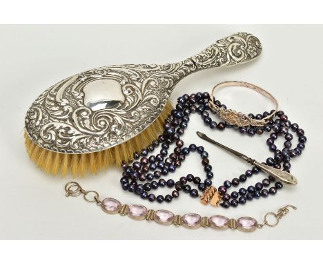 A SELECTION OF ITEMS, to include a silver foliate embossed hair brush, hallmarked Chester 1906, a silver manicure tool, hallm