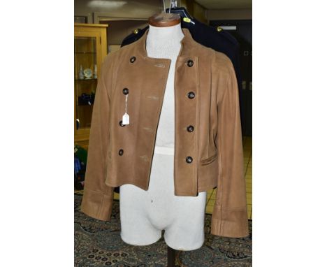 AN ITALIAN LEATHER LADIES LIGHT BROWN JACKET by O.B.E. Bespoke leather specialists, having feature design to the front to be 
