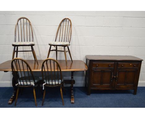AN ERCOL DARK ELM MODEL 757 DINING TABLE, length 184cm x depth 81cm x height 72cm, six Windsor Quaker chairs and an Ercol col