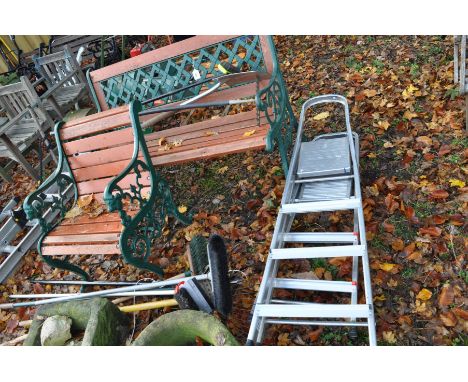A CAST METAL GARDEN BENCH AND A SIMILAR CHAIR together with a small quantity of garden tools and two aluminium step ladders (
