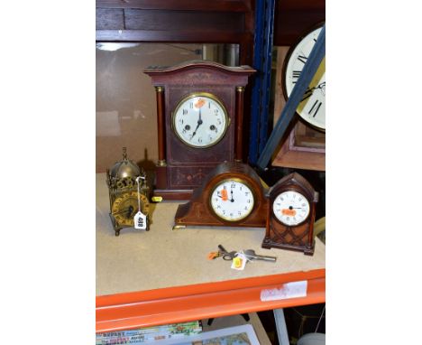 TWO EDWARDIAN MAHOGANY AND INLAID MANTEL CLOCKS, the larger with enamel dial, eight day movement, gong strike, with pendulum 