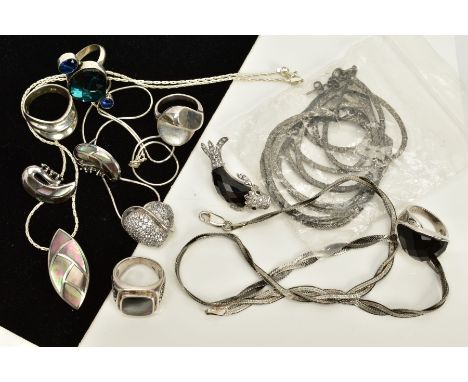 A COLLECTION OF WHITE METAL JEWELLERY to include various pendants and gem set rings and chains to include mother of pearl and