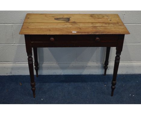 A VICTORIAN STAINED PINE SIDE TABLE, with two drawers, width 91cm x depth 45cm x height 72cm