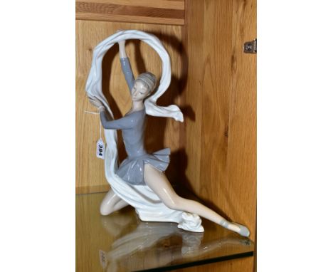 A NAO FIGURE OF A BALLERINA WITH SWIRL OF CLOTH AROUND HER, height 33cm&nbsp; Condition Report&nbsp; Very minor scratch to on