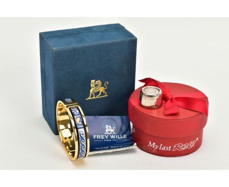 A SILVER ROLO KEEPSAKE AND AN ENAMEL FREY WILLE BANGLE, the cased silver Rolo engraved 'To Dave, for you my last rolo', hallm