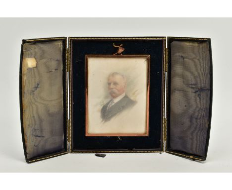 A CASED MINIATURE PORTRAIT, the blue and gold trim case, opens to reveal a miniature portrait of a gentleman, signed I.A. 192