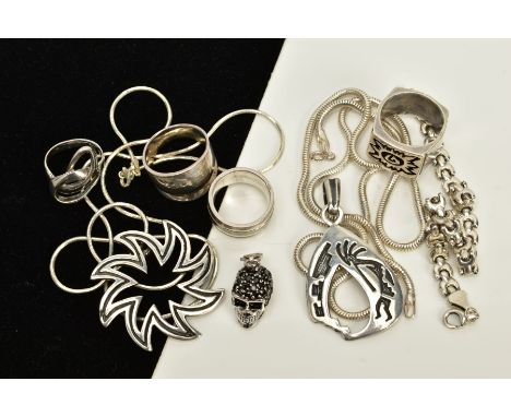 A SELECTION OF WHITE METAL JEWELLERY, to include a two snake chains, one with an openwork star pendant, each stamped 925, a w