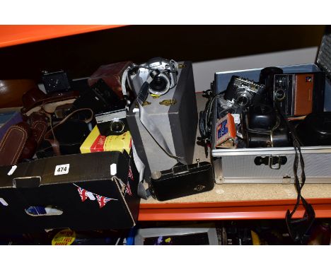 A TRAY AND AN ALUMINIUM CASE CONTAINING VINTAGE AND MODERN CAMERAS including a Voigtlander Vitomatic 2, a Canon S2is digital 