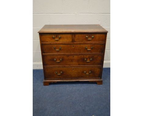 A GEORGE III OAK CHEST OF TWO SHORT OVER THREE LONG GRADUATED DRAWERS, with swan neck handles on bracket feet, width 96cm x d