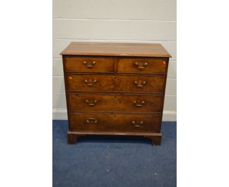 A GEORGIAN OAK CHEST OF TWO SHORT OVER THREE LONG GRADUATING DRAWERS, with brass swan neck handles, on bracket feet, width 10