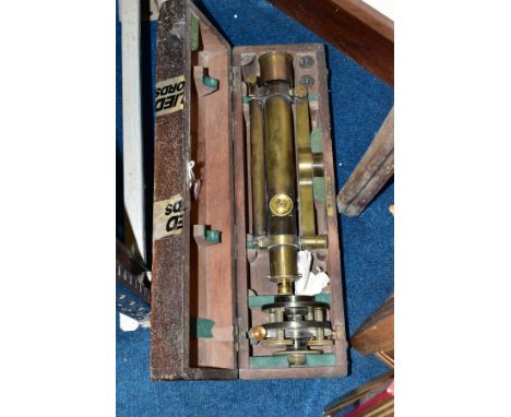 A CASED BRASS TROUGHTON &amp; SIMMS OF LONDON THEODOLITE, the case fitted with two further lenses and tripod attachment, toge