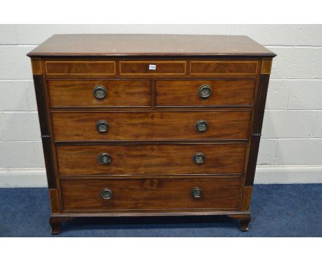 A GEORGIAN MAHOGANY CHEST OF TWO SHORT OVER THREE LONG DRAWERS, with three secret frieze drawers, with brass circular drop ha