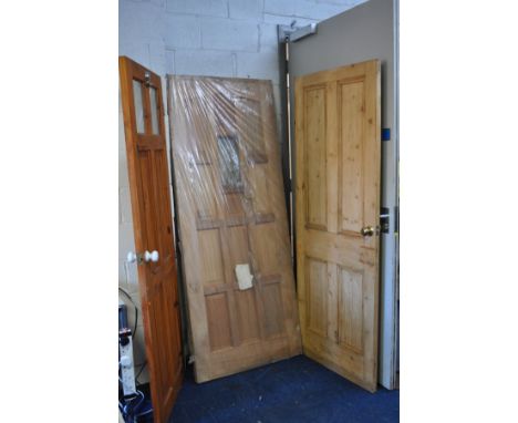 THREE WOODEN DOORS, comprising of a new mahogany external door (no glass), height 204cm x width 84cm, a vintage pine internal