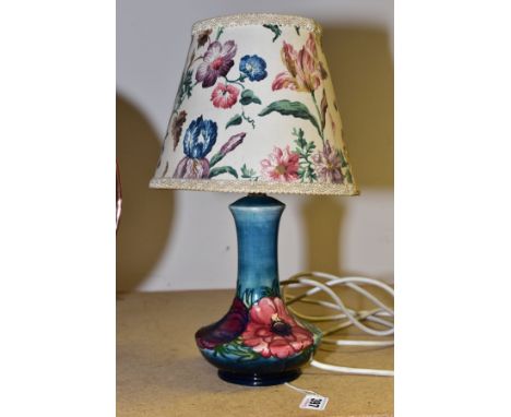 A MOORCROFT POTTERY TABLE LAMP OF BALUSTER FORM, red and purple anemone on a mottled green/blue back ground, impressed marks 