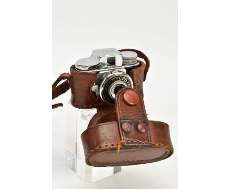 A MINIATURE LEATHER CASED MYCRO CAMERA, lens signed 'Mycro UNA 1.45 F=20mm, accompanied with original leather case signed 'My