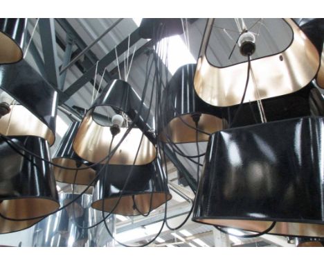 DESIGN HEURE NUAGE CHANDELIER, by Hervé Langlais, in the form of a cluster of ten black gloss shades, approx. 200cm L as curr