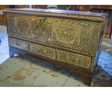 ZANZIBAR TRUNK, late 19th/early 20th century, teak and brass bound, with rising lid, three drawers and carrying handles, 62cm