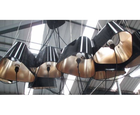 DESIGN HEURE NUAGE CHANDELIER, by Hervé Langlais, in the form of a cluster of ten black gloss shades, approx. 200cm L as curr