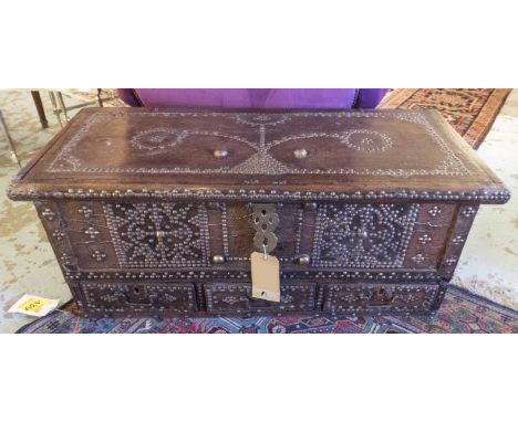 ZANZIBAR TRUNK, 19th century, teak with brass studwood detail, rising lid above three short drawers, 40cm x 41cm H x 96cm.