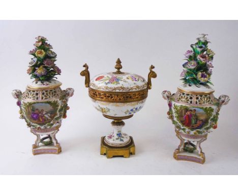 CERAMIC POT POURRI, a pair, 19th century German, with floral encrusted lids, triform supports, 34.5cm H; together with a flor