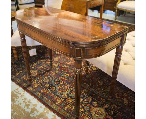 CARD TABLE, Regency mahogany, D shaped, foldover baize lined with reeded tapering supports, in the manner of Gillows of Lanca