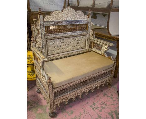 SOFA, Damascus parquetry and mother of pearl inlaid, with script crested panel back, spindle arms and squab cushion seat, 138