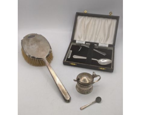 A group of silver items to include a dressing table brush having engine turned decoration along with a Christening set to inc