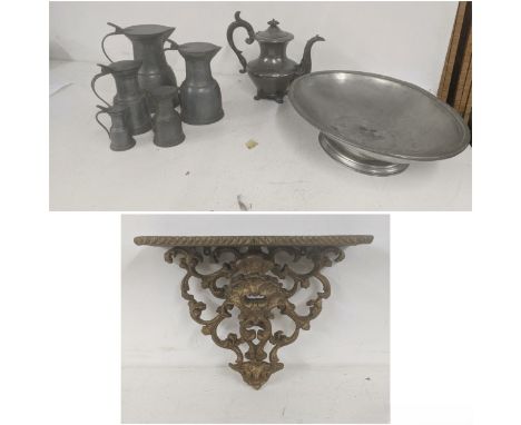 A group of pewter items to include a set of five graduated jugs stamped to the base Peltrato '95 along with coffee pot and pe