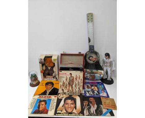 Elvis related items including figure reputedly to be made from his clothing, records, guitar shaped mirror and other itemsLoc