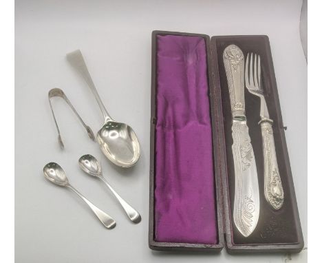 A group of silver and silver plated items to include an 18th century silver tablespoon, a pair of silver sugar tongs, two lar